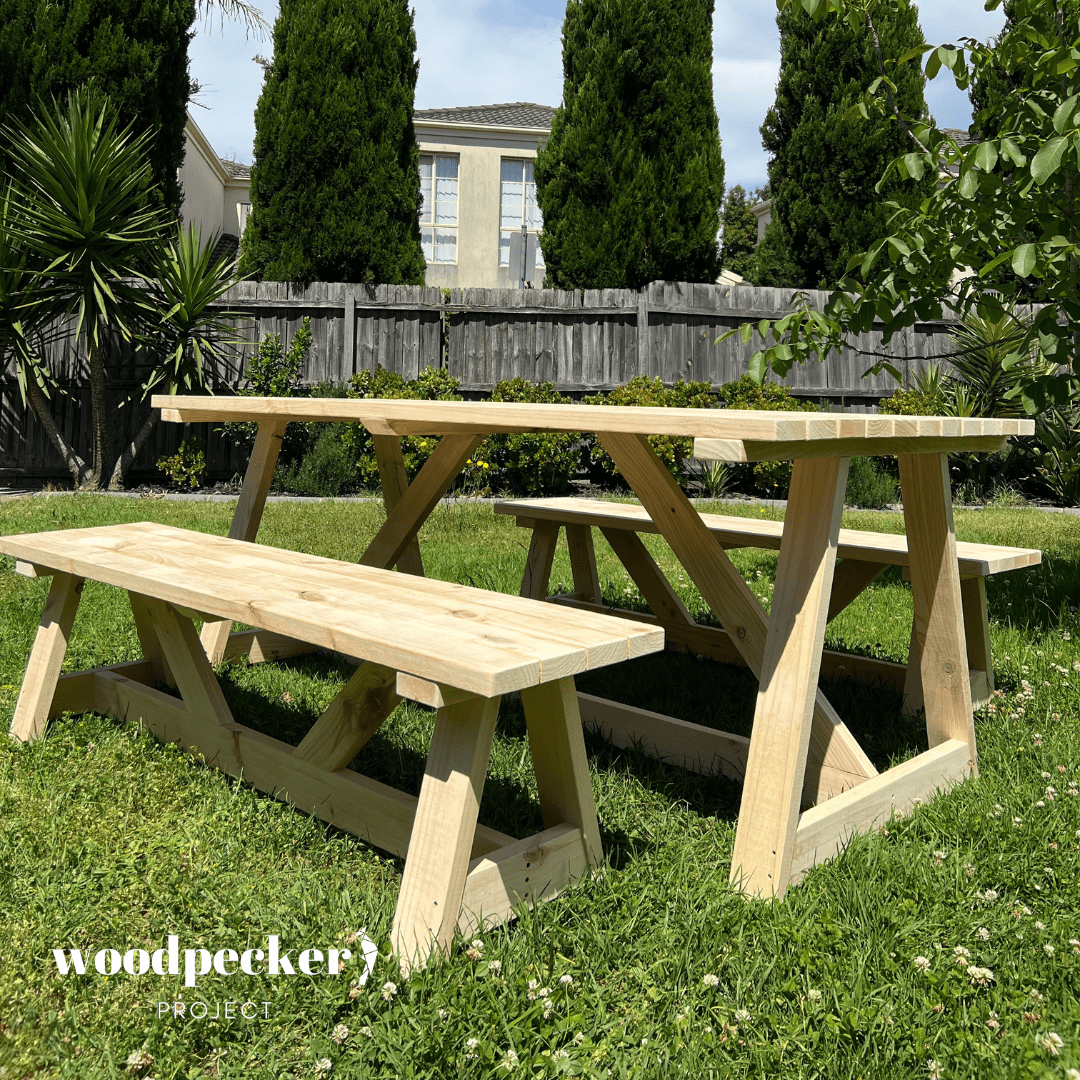 Modern outdoor table set featuring a built-in umbrella hole, perfect for shaded dining and outdoor comfort on sunny days