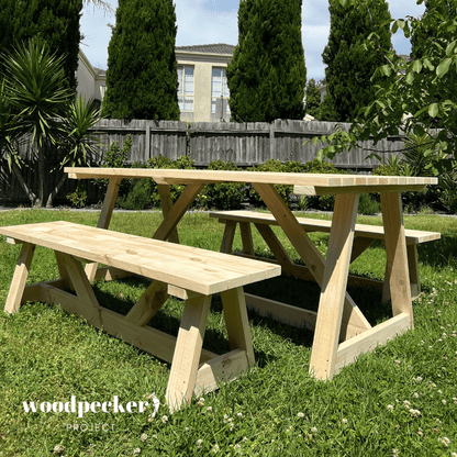 Modern outdoor table set featuring a built-in umbrella hole, perfect for shaded dining and outdoor comfort on sunny days