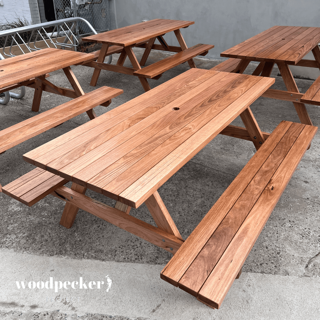 Picnic tables with attached grills for outdoor cooking