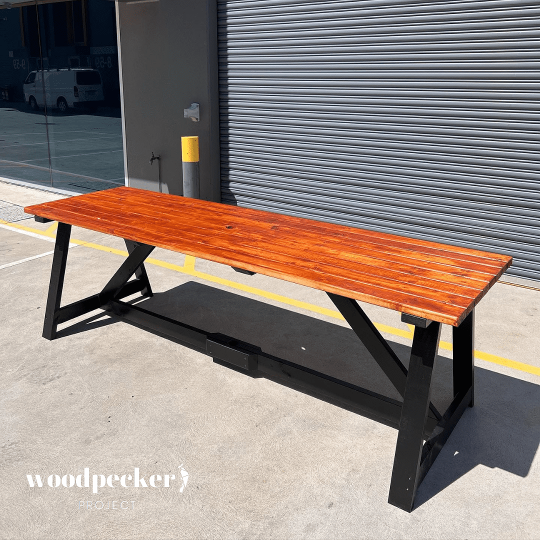 Modern outdoor table set constructed with UV-resistant materials, ensuring long-lasting use and protection from sun damage