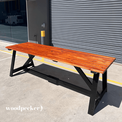 Modern outdoor table set constructed with UV-resistant materials, ensuring long-lasting use and protection from sun damage