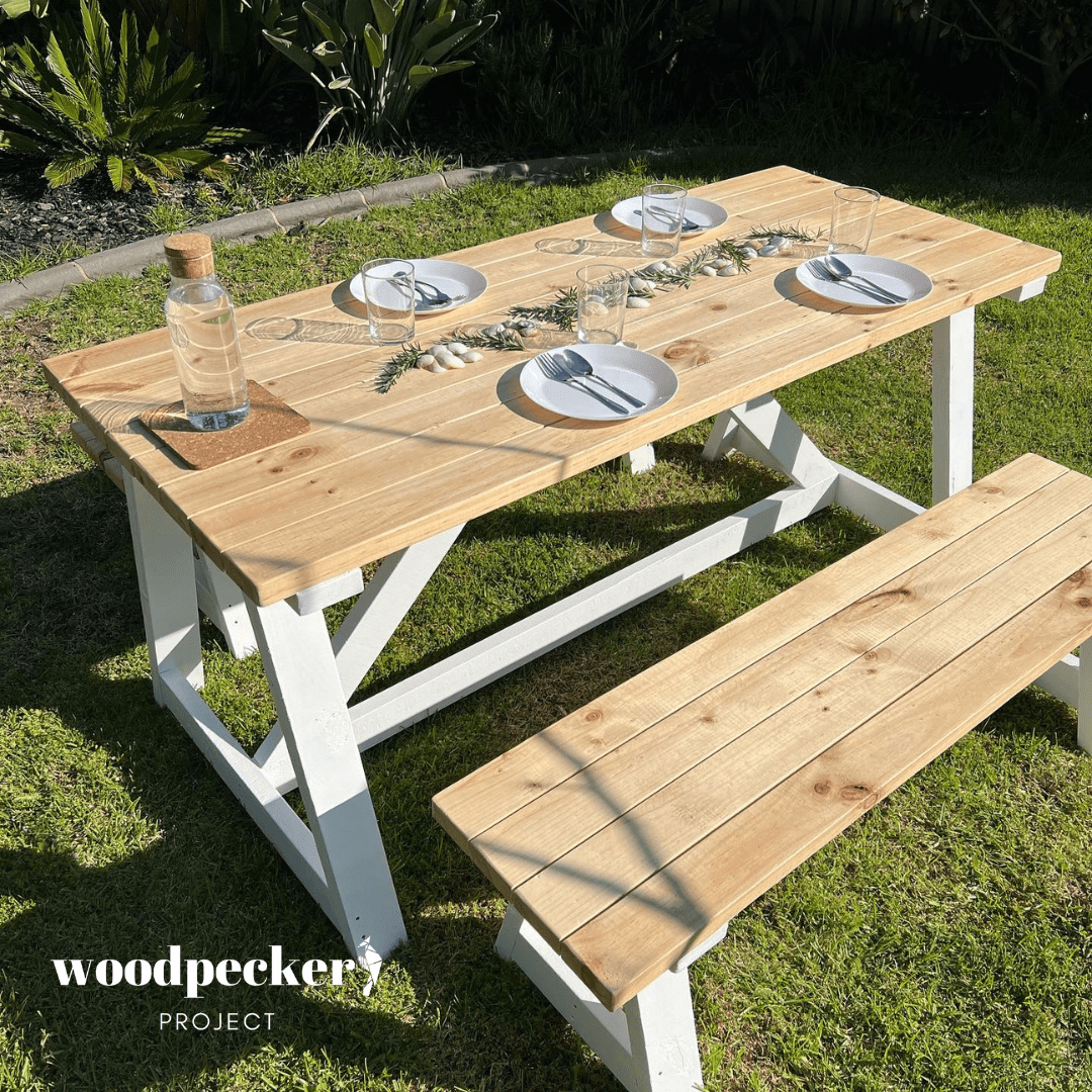 Sleek modern outdoor table set featuring a minimalist design, perfect for stylish patio dining and enhancing your outdoor space