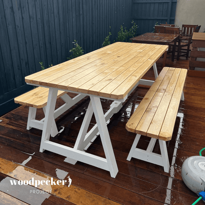 Modern outdoor table set with a fire pit centerpiece, perfect for cozy evenings and adding warmth to your outdoor gatherings