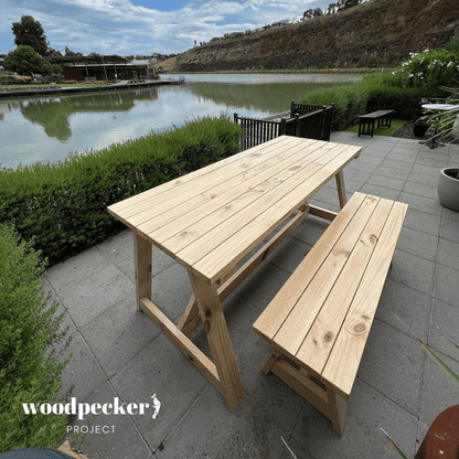 Chic modern outdoor dining set with sleek lines and durable construction, perfect for contemporary outdoor spaces
