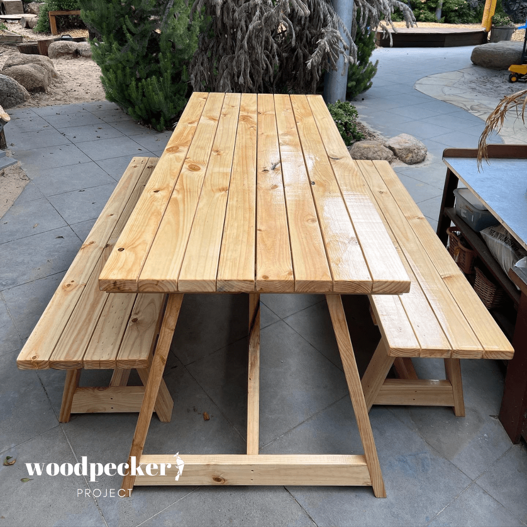 Durable modern outdoor dining set with a powder-coated steel frame, ensuring resistance to the elements and long-term use