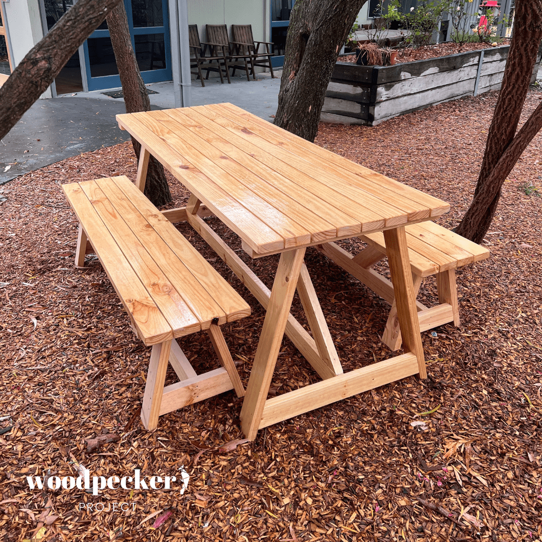Luxury modern outdoor dining table set with all-weather wicker chairs, providing a sophisticated and durable dining experience